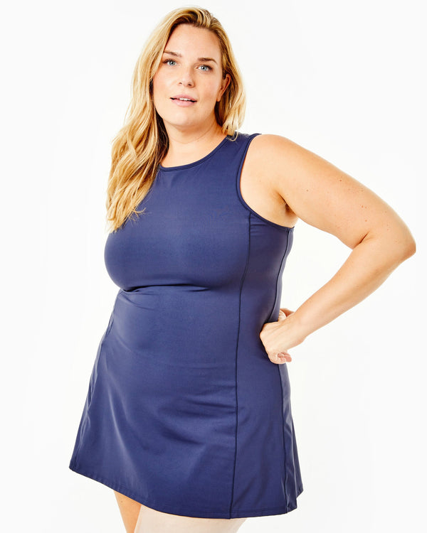 Model is wearing the Panama Dress in Navy
