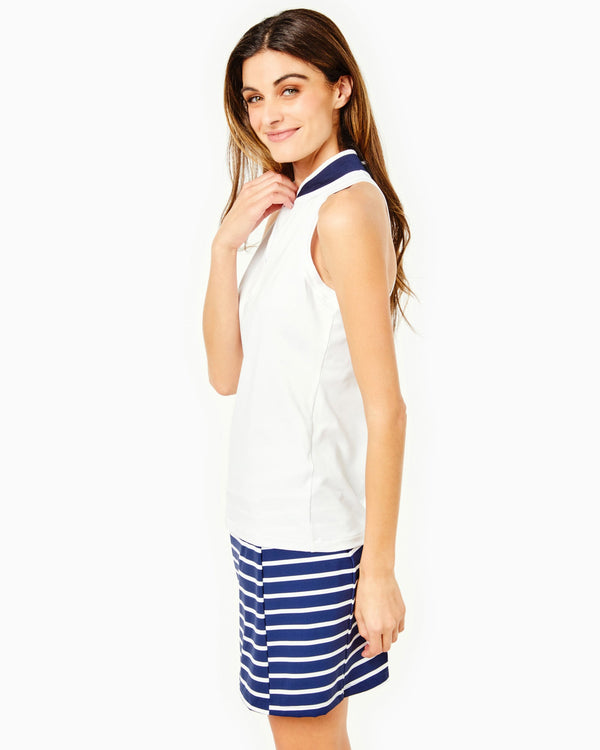 'On model product image of Active Pique Sleeveless Courtside Polo in White/Navy'